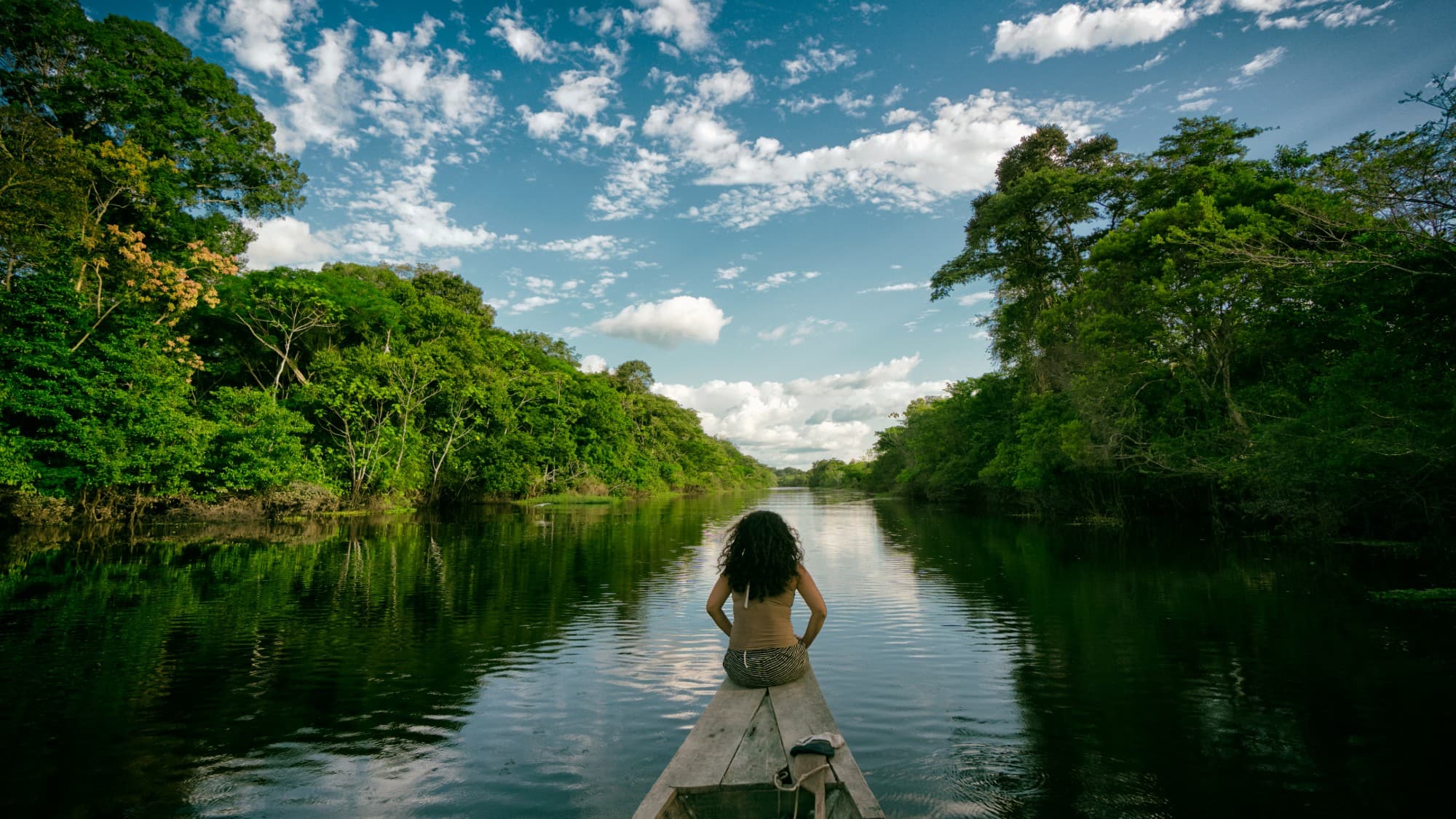 Amazon river expedition at golden hour